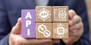 Building blocks with the word API written on them