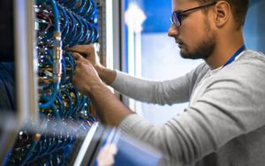 A network engineer working on a network task.