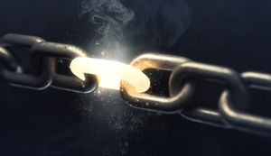 a 3D image of an iron chain with one link burning